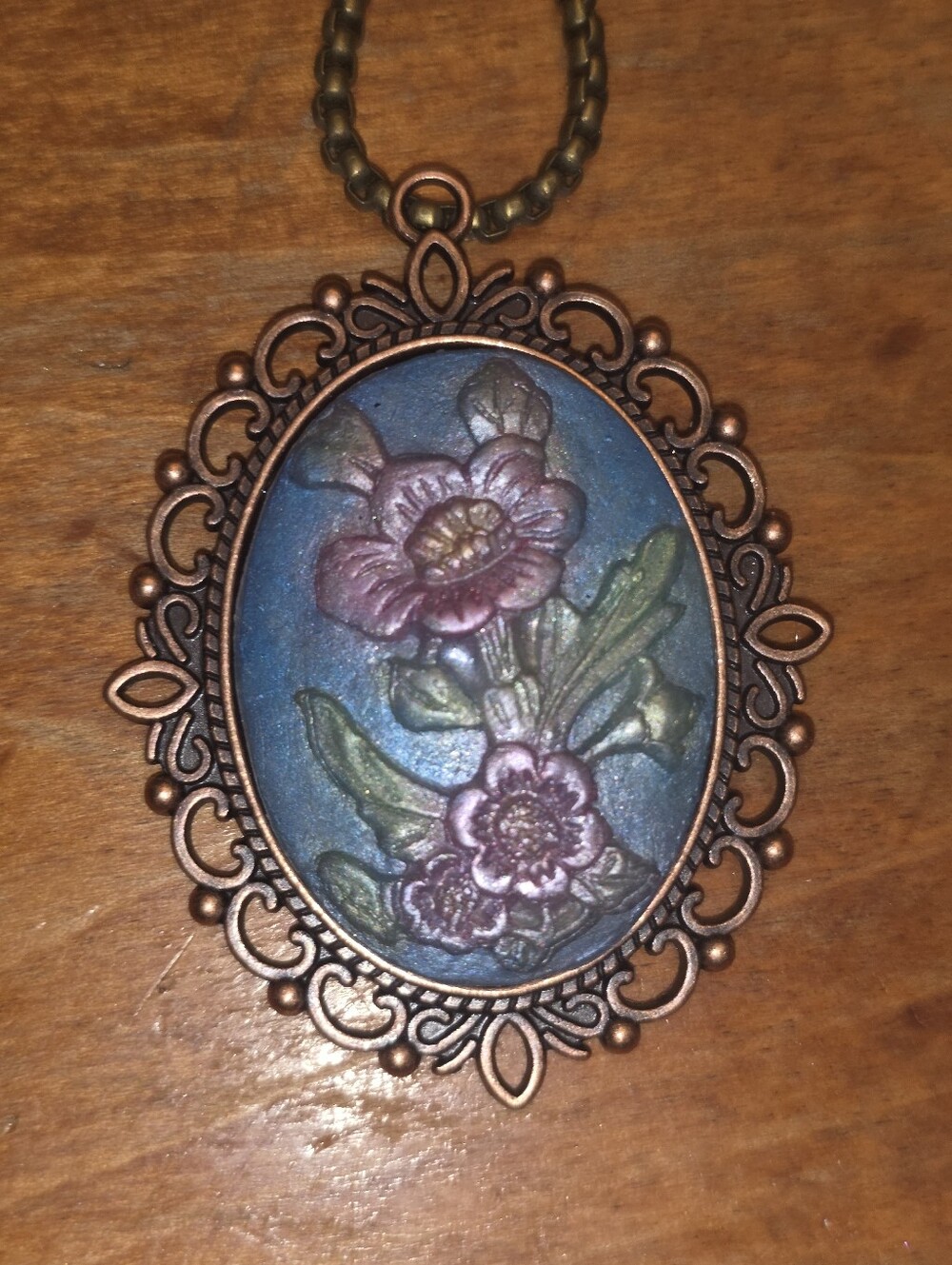 Hibiscus Floral Resin Pendant With Bronze Tone Frame & Stainless Steel Chain